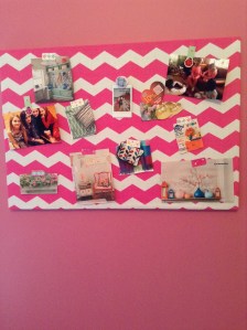 Magnet board with cozy pictures that  include warm colors